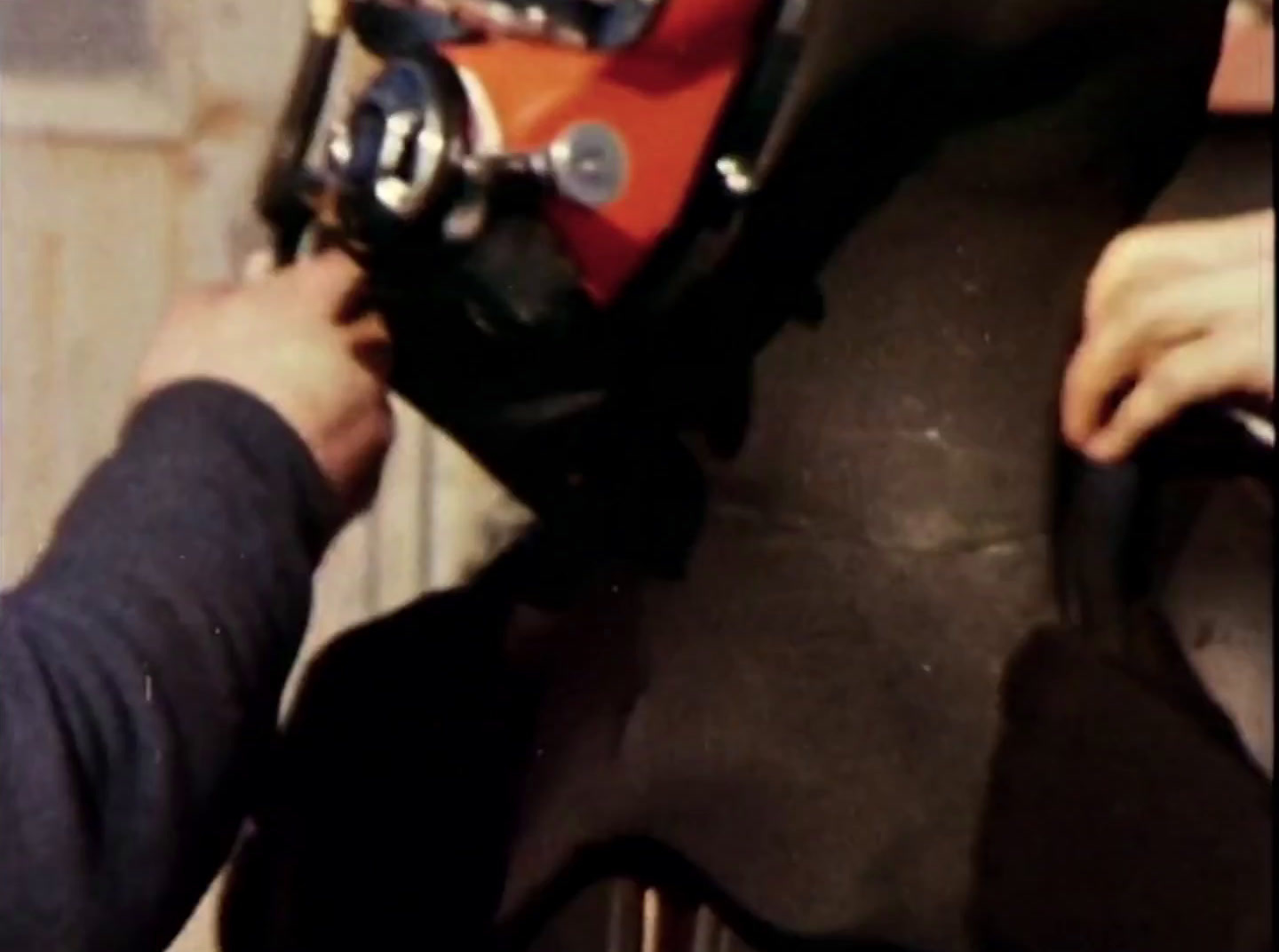 a person working on a piece of furniture