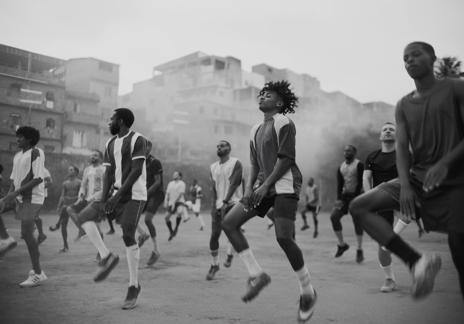 a group of young men playing a game of soccer