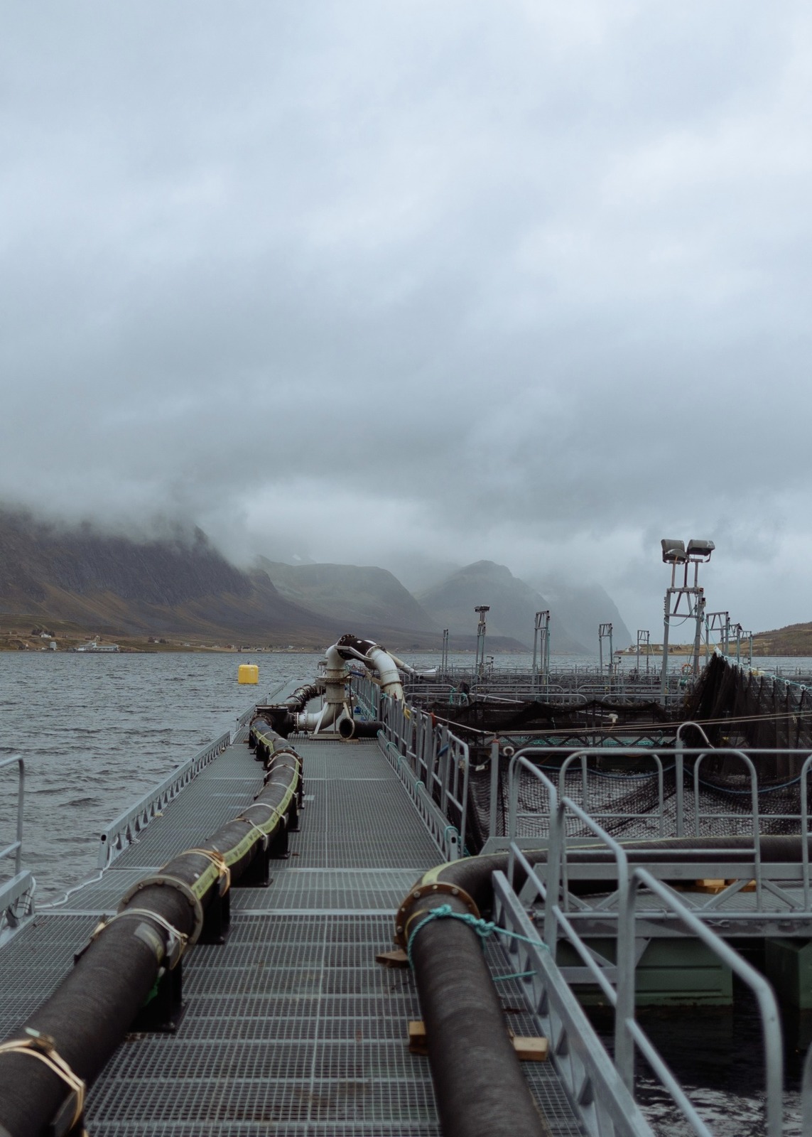 a large pipe sitting on top of a pier