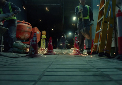 a group of construction workers standing next to each other