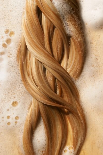 a long blonde hair laying on top of a table