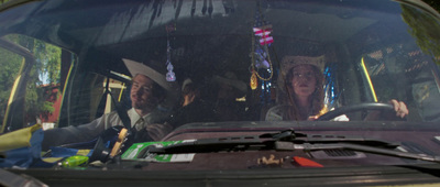 a group of people sitting inside of a vehicle