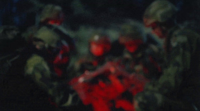 a blurry image of a group of soldiers