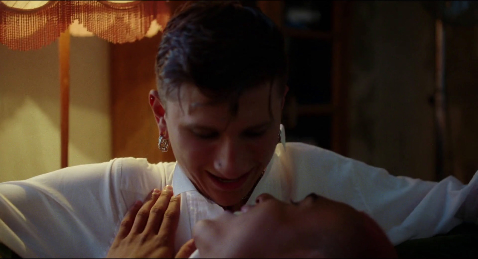 a man holding a baby in his arms