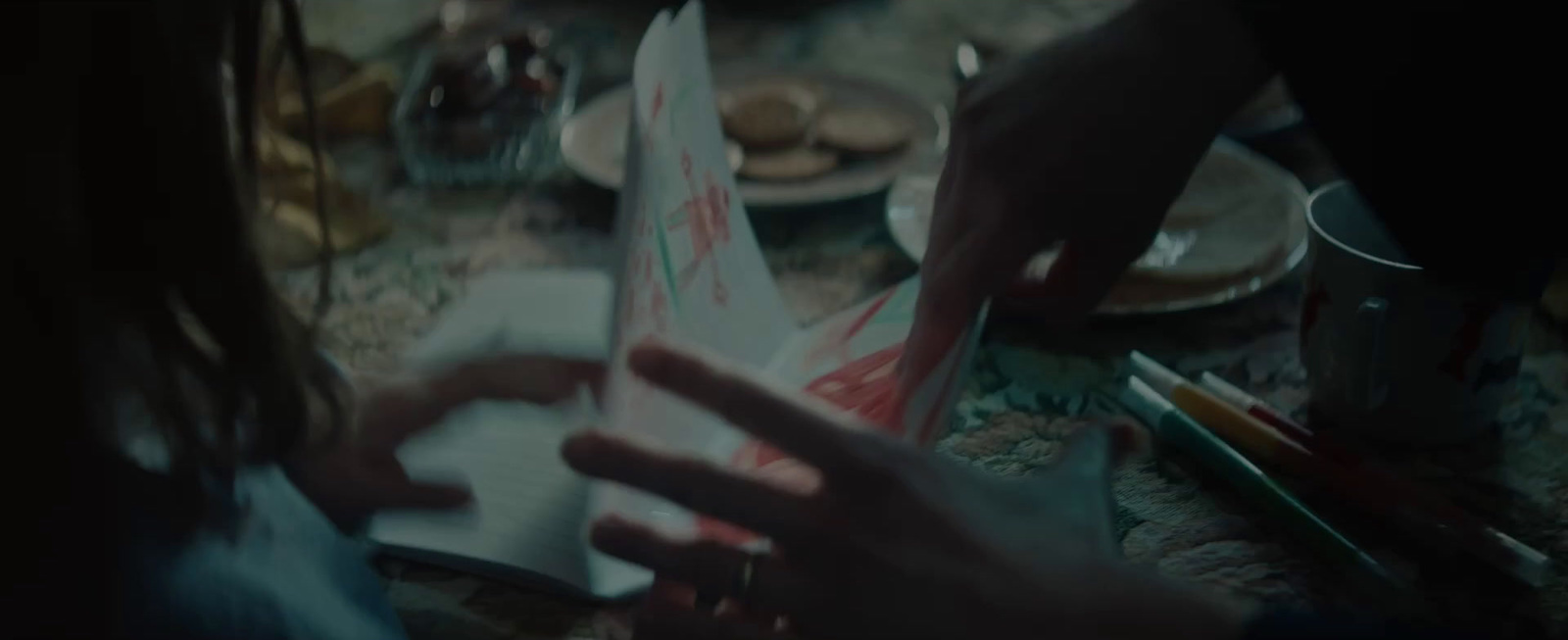 a close up of a person holding a box of food