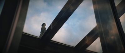 a person standing on top of a roof