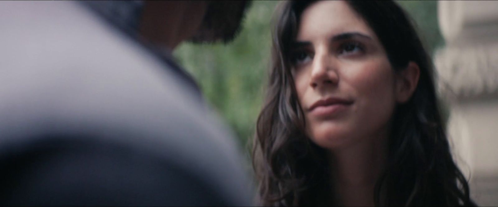 a close up of a person with long hair