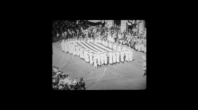 a group of people standing in front of an american flag