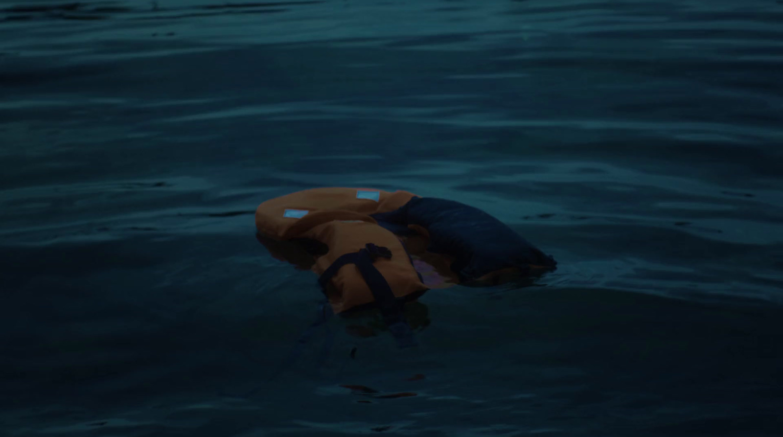 an inflatable raft floating in a body of water