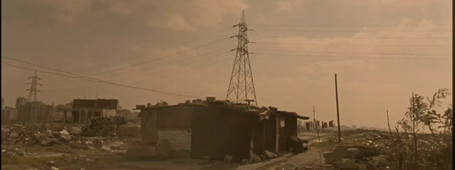 an old photo of a shack in the middle of a city