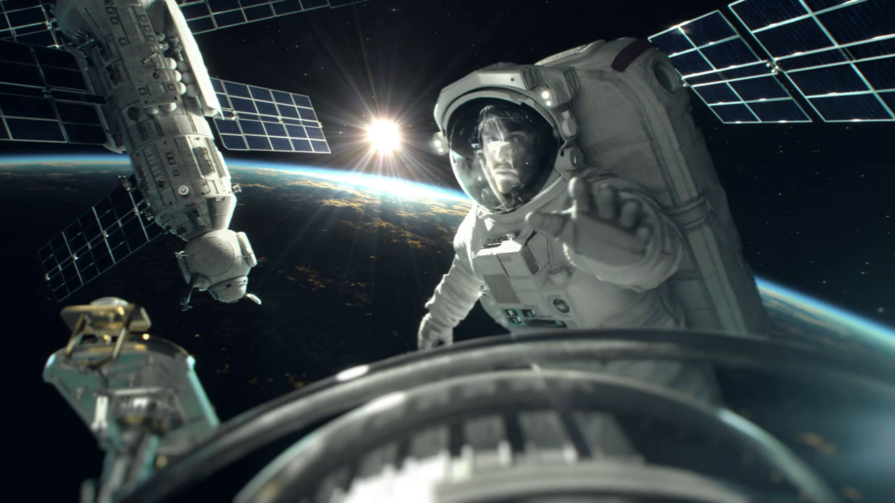 a man in a space suit standing in front of a space station