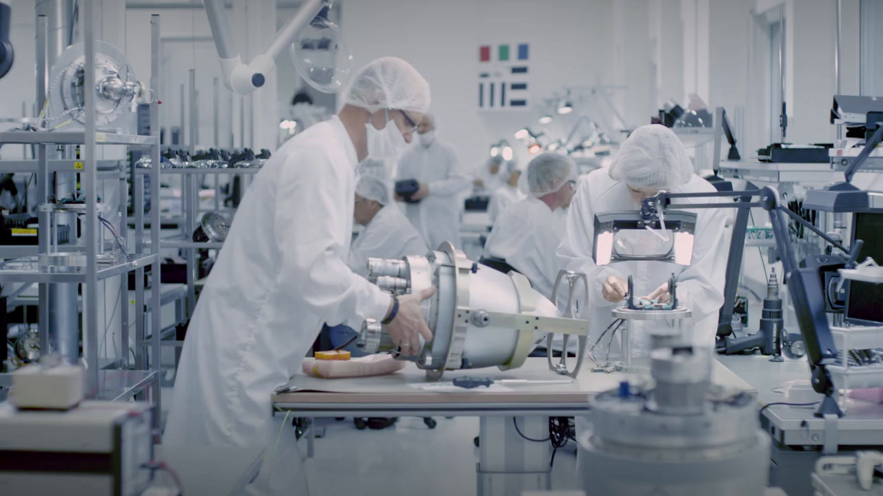 a group of people working in a factory