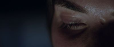 a close up of a person's eye with a blurry background