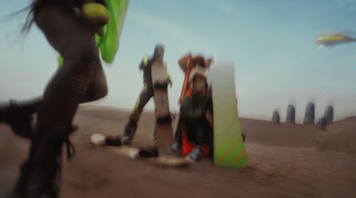 a blurry photo of a group of people with surfboards