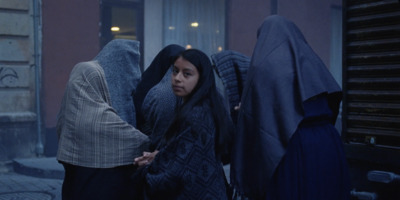 a group of women standing next to each other