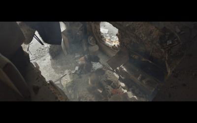 an aerial view of a dirty kitchen with a stove