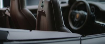 a close up of a steering wheel and dashboard of a car