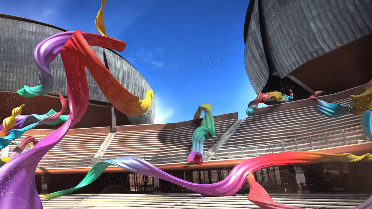 a group of people flying kites over a stadium