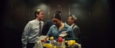 a group of men standing next to each other in a bathroom