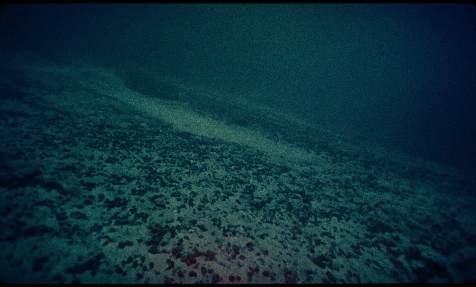 an underwater view of a large body of water