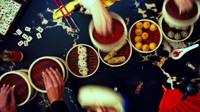 a table topped with bowls filled with food