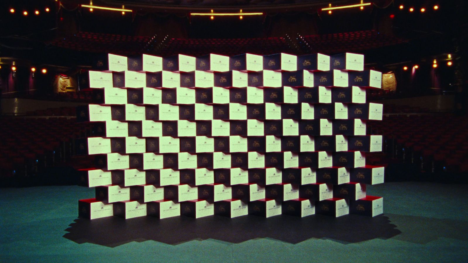 a black and white checkerboard pattern on a stage