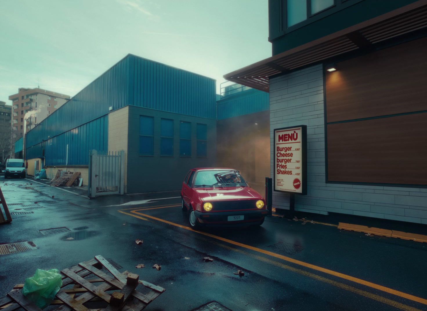 a small red car parked in front of a building