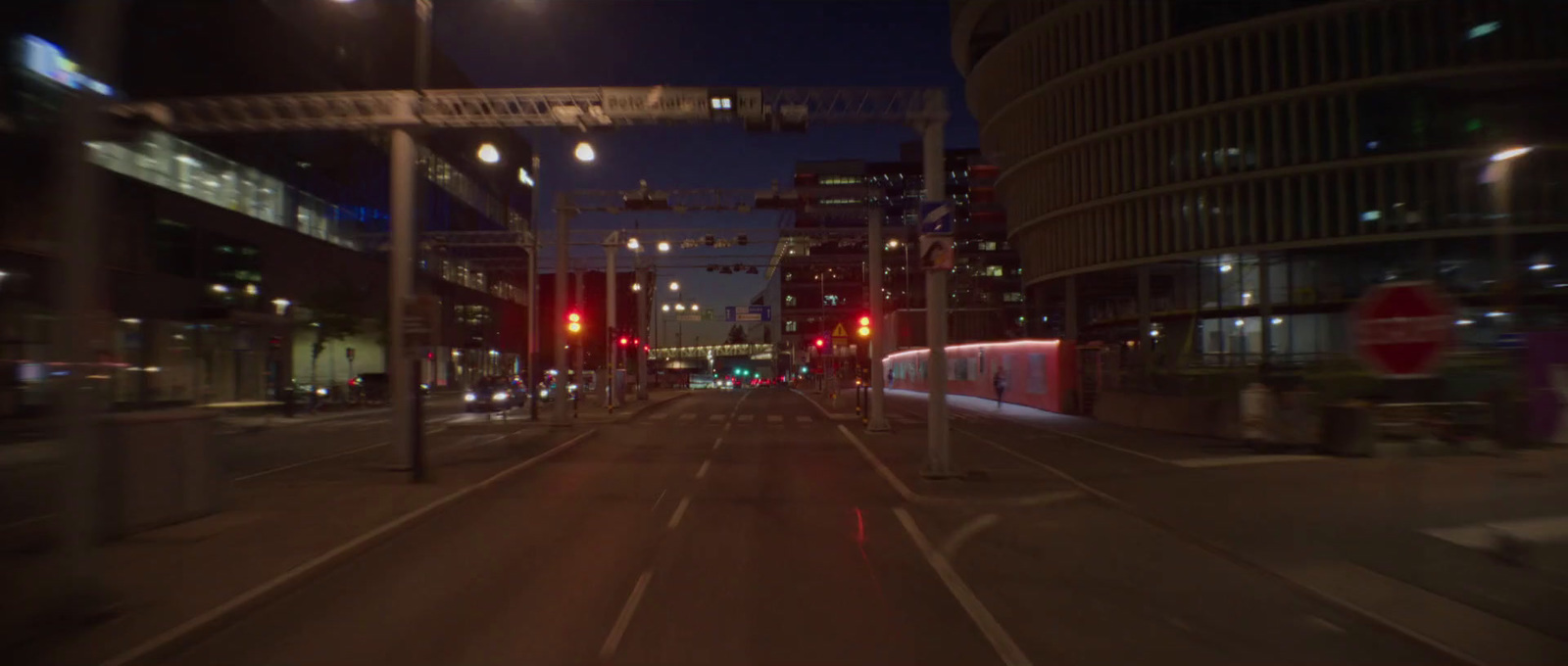 a blurry photo of a city street at night