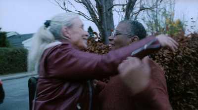 a man and a woman standing next to each other