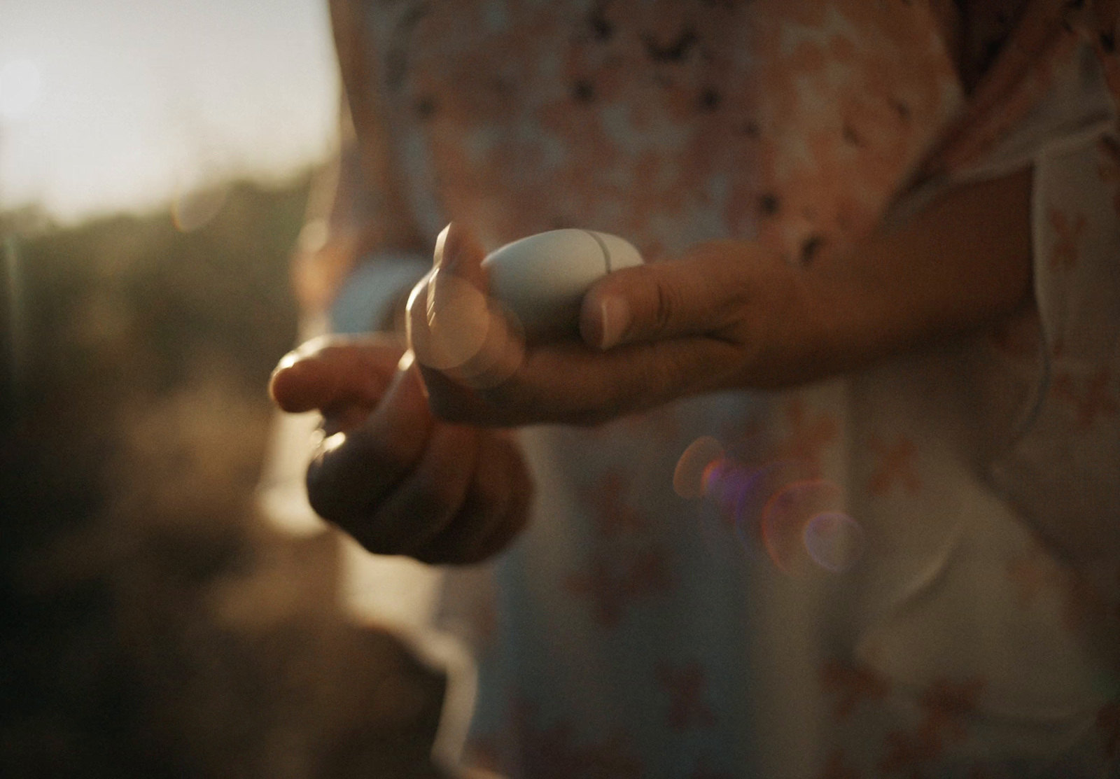 a close up of a person holding something in their hands