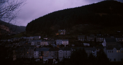 a city with a mountain in the background