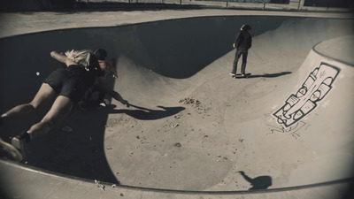 a man riding a skateboard up the side of a ramp