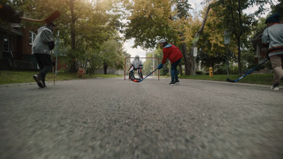 a group of people playing a game of tennis