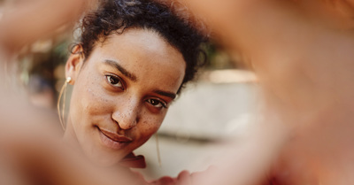 a close up of a person looking at the camera