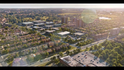 an aerial view of a city with lots of trees