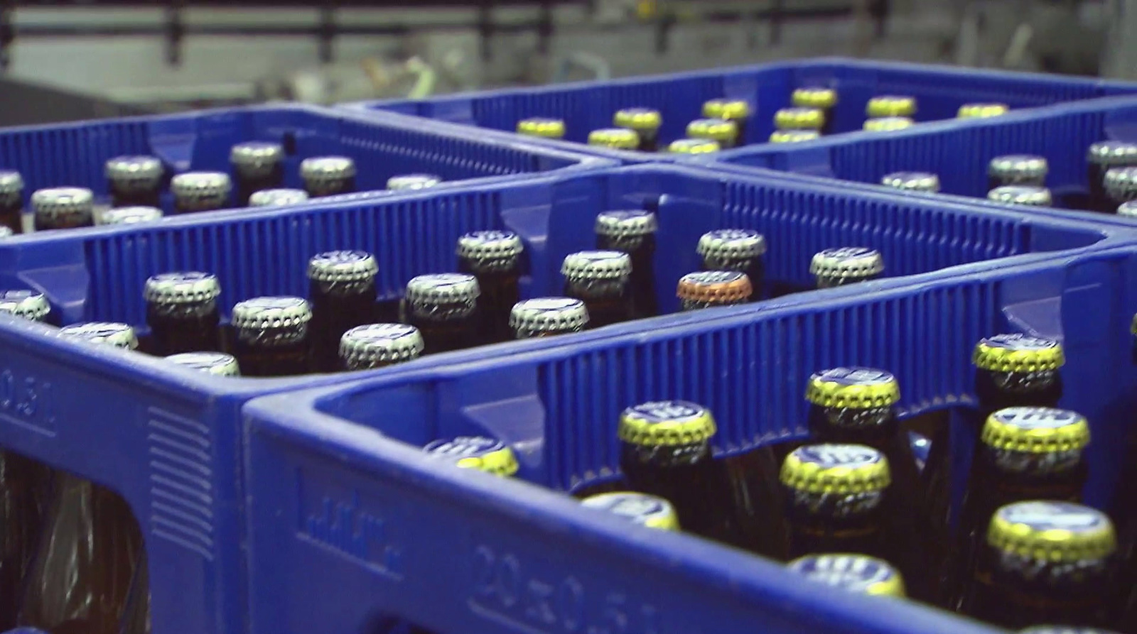 a close up of a bunch of bottles of beer