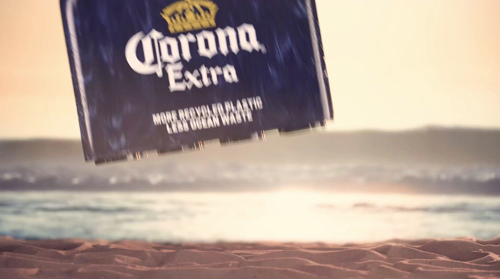 a corona extra sign hanging from the side of a building