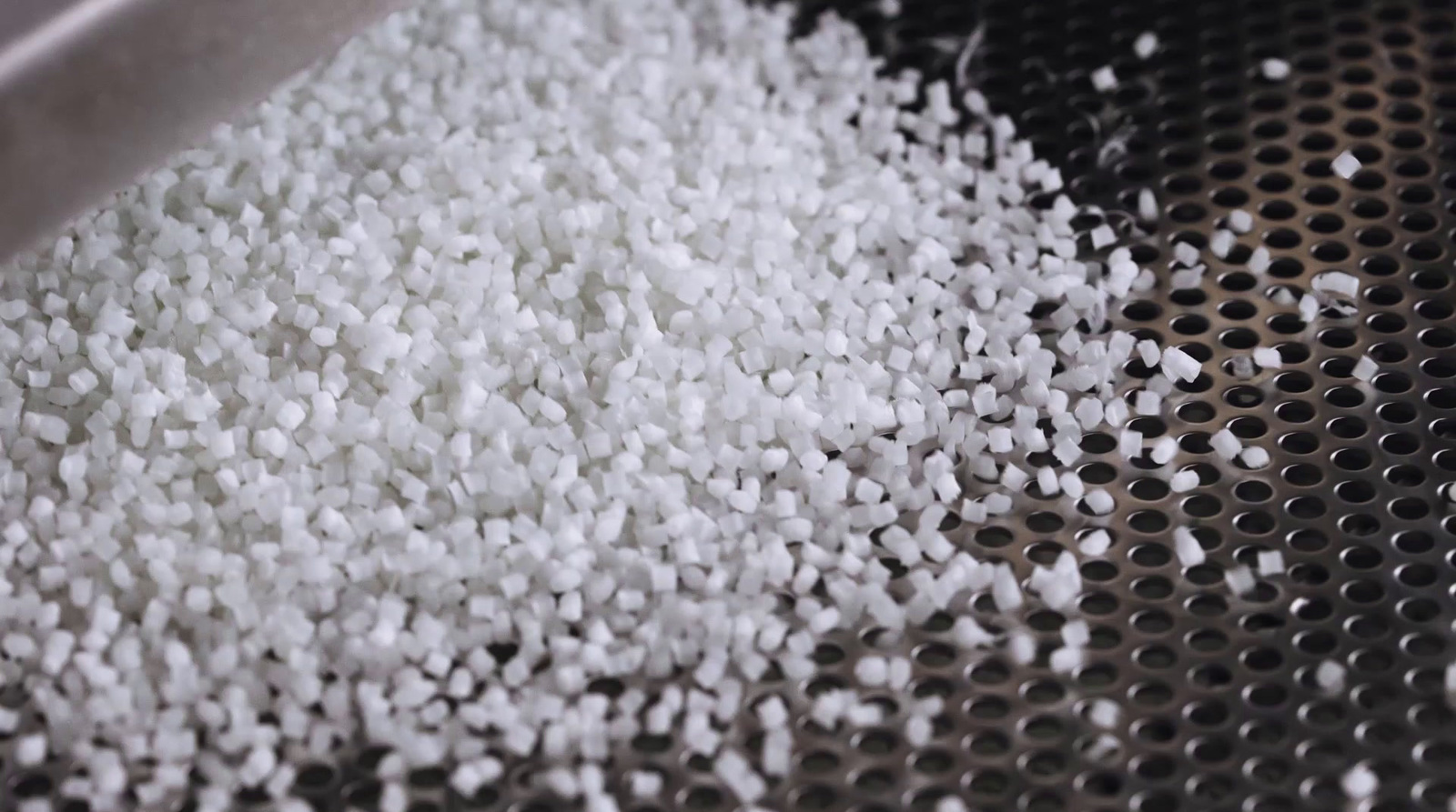 a pile of white rice sitting on top of a frying pan