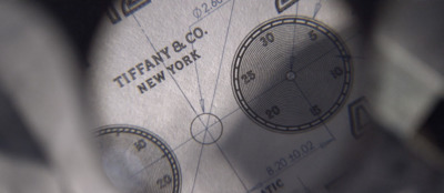 a close up view of a new york city map through a magnifying glass