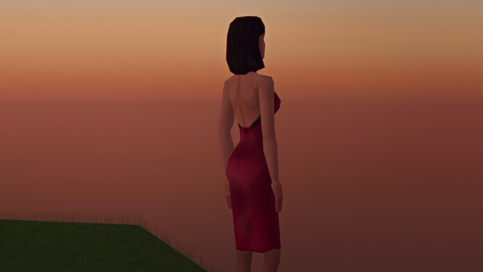 a woman in a red dress standing on a hill