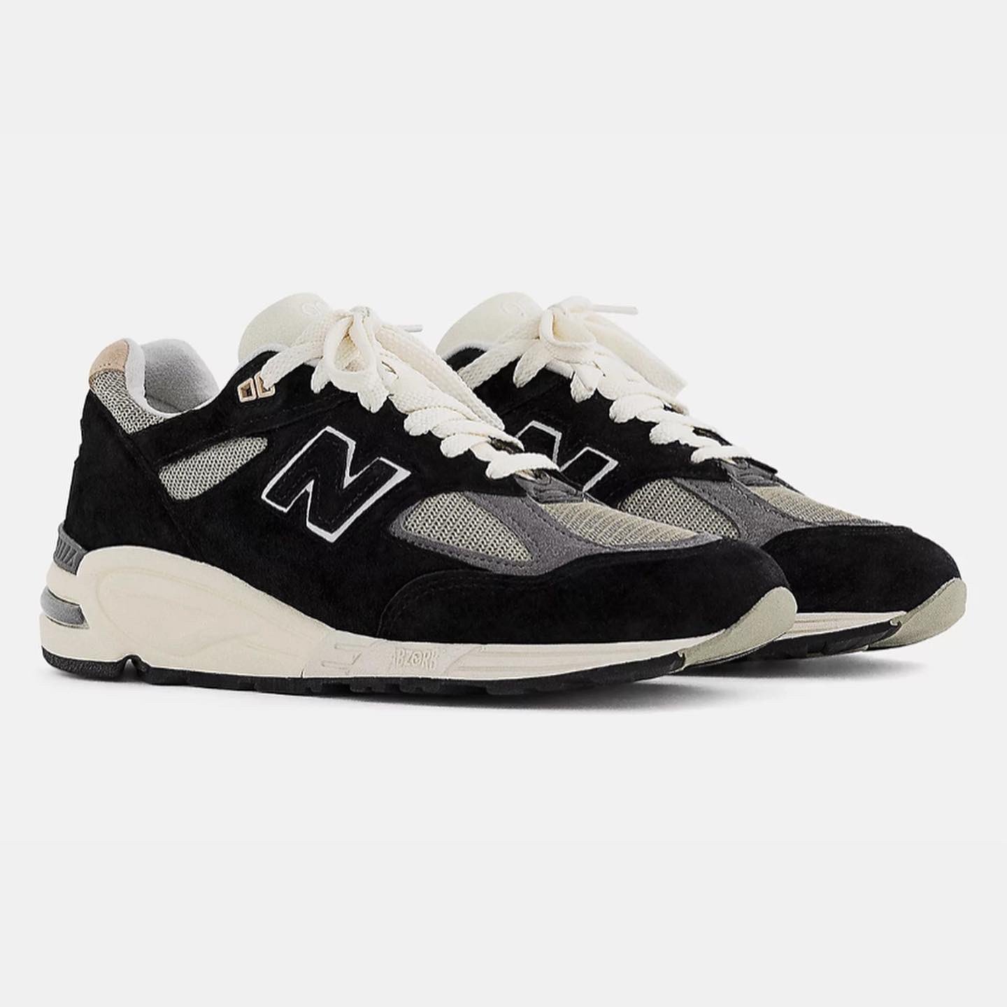 a pair of new balance 997 sneakers