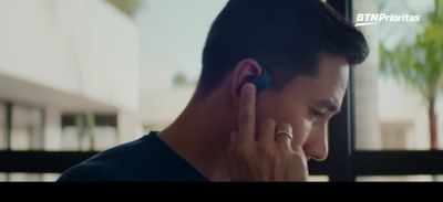 a man holding a cell phone to his ear