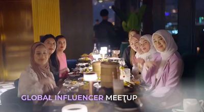 a group of women sitting at a table together