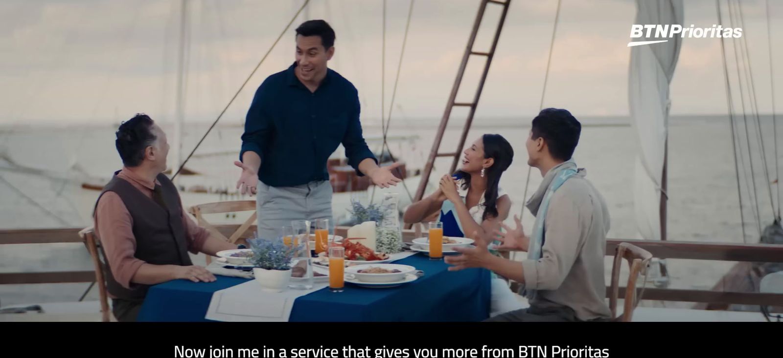 a group of people sitting around a table