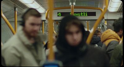 a group of people riding a subway train