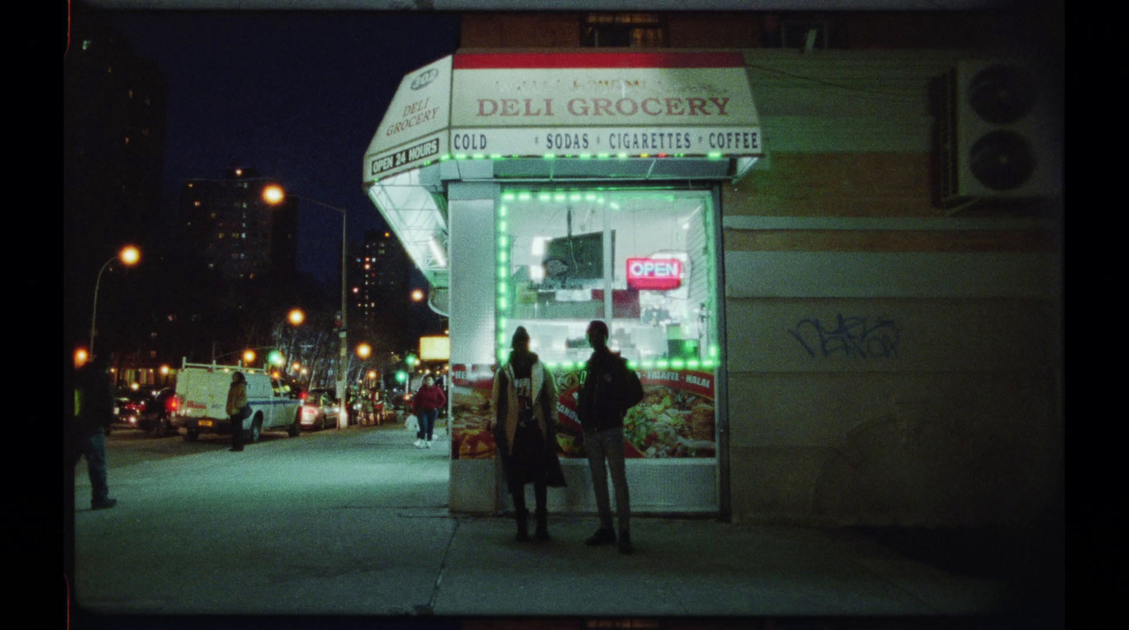 a couple of people that are standing in front of a store