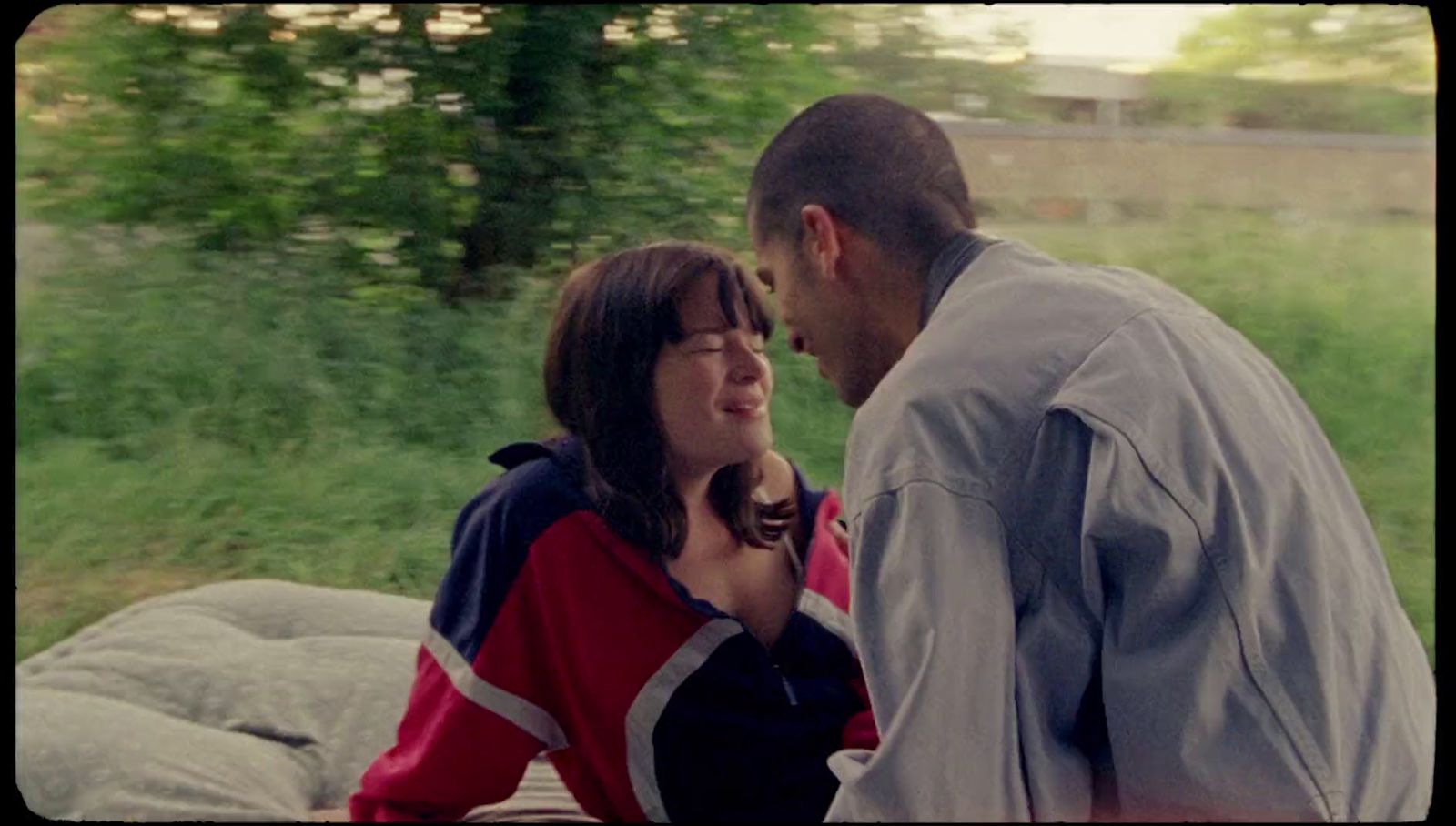 a man and a woman standing next to each other