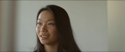 a close up of a person with long hair