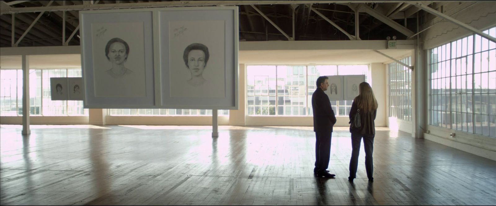 a couple of people standing in a room