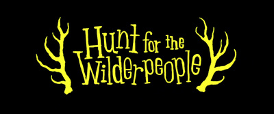 a black background with yellow lettering that says hunt for the wild people